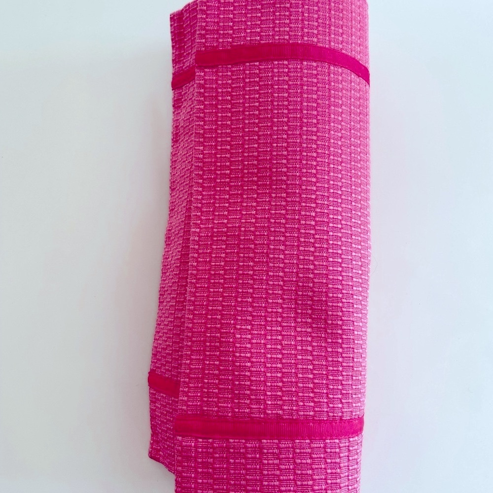 Set of four pink placemats with pink ribbon